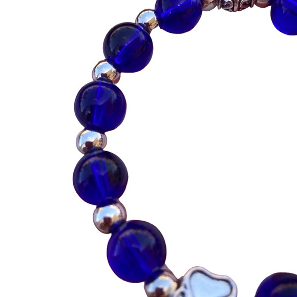 Bead bracelet with Paw Print blue translucent bead Silvertone stretch - Picture 5 of 9